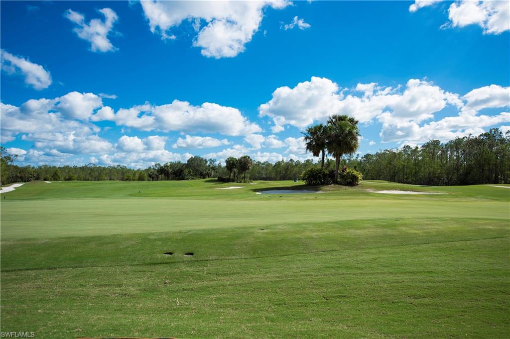 7635 Arbor Lake Court, Unit 2423 Naples, FL 34112 - Photo 30 of 35 a view of an ocean yard and outdoor seating