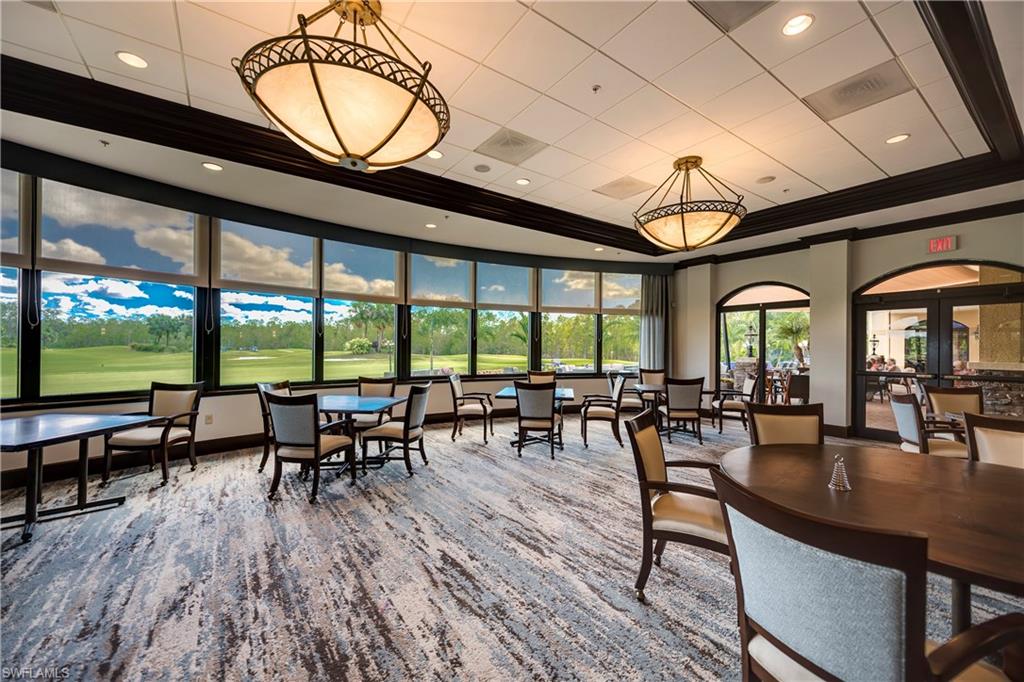 7635 Arbor Lake Court, Unit 2423 Naples, FL 34112 - Photo 32 of 35 a very nice looking living room with a large window