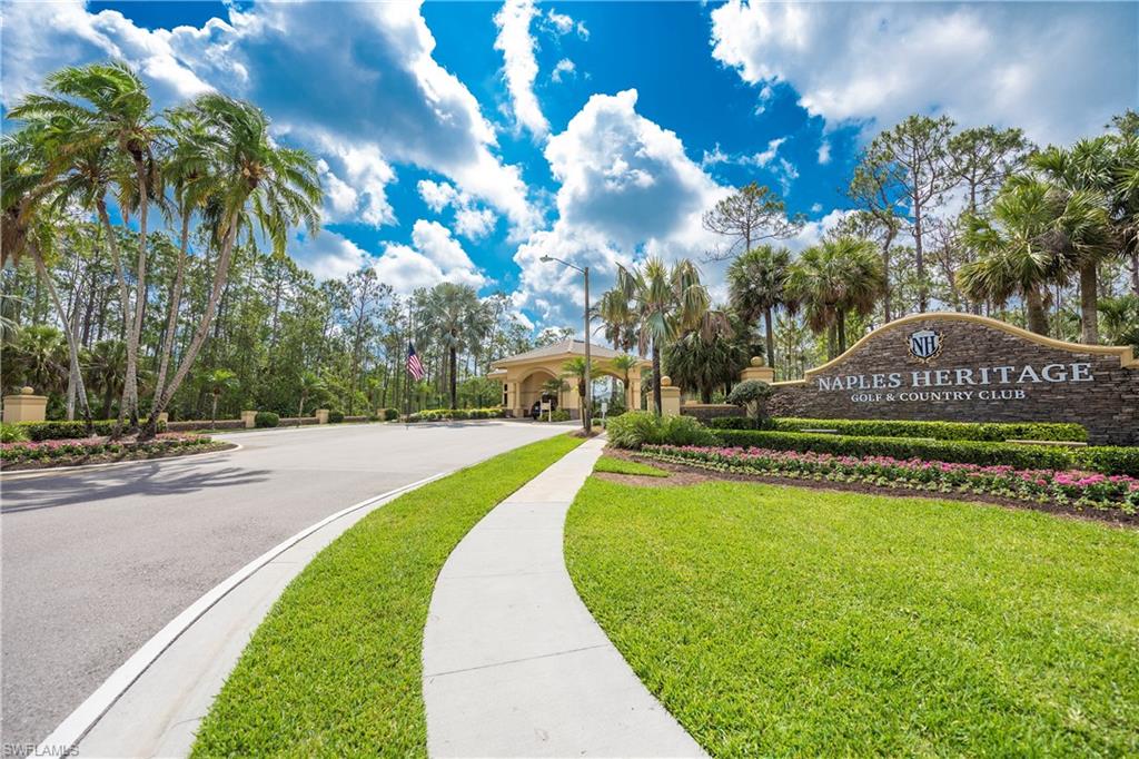 7635 Arbor Lake Court, Unit 2423 Naples, FL 34112 - Photo 35 of 35 a view of a swimming pool with a garden