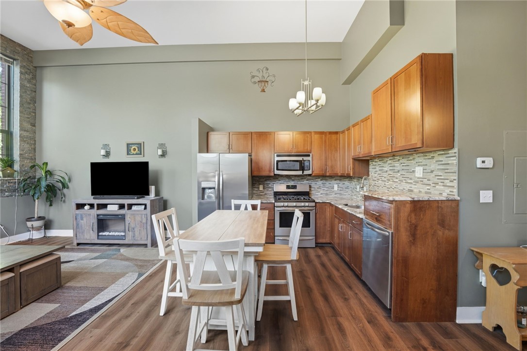 180 Allen Street, Unit 101 Woonsocket, RI 02895 - Photo 5 of 40 open kitchen and dining