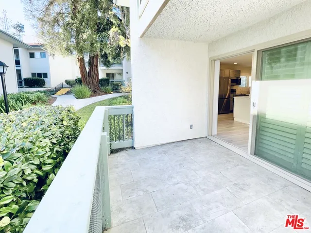 a view of a back yard of the house