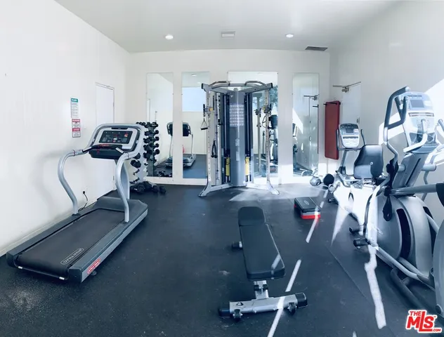 a view of a room with gym equipment