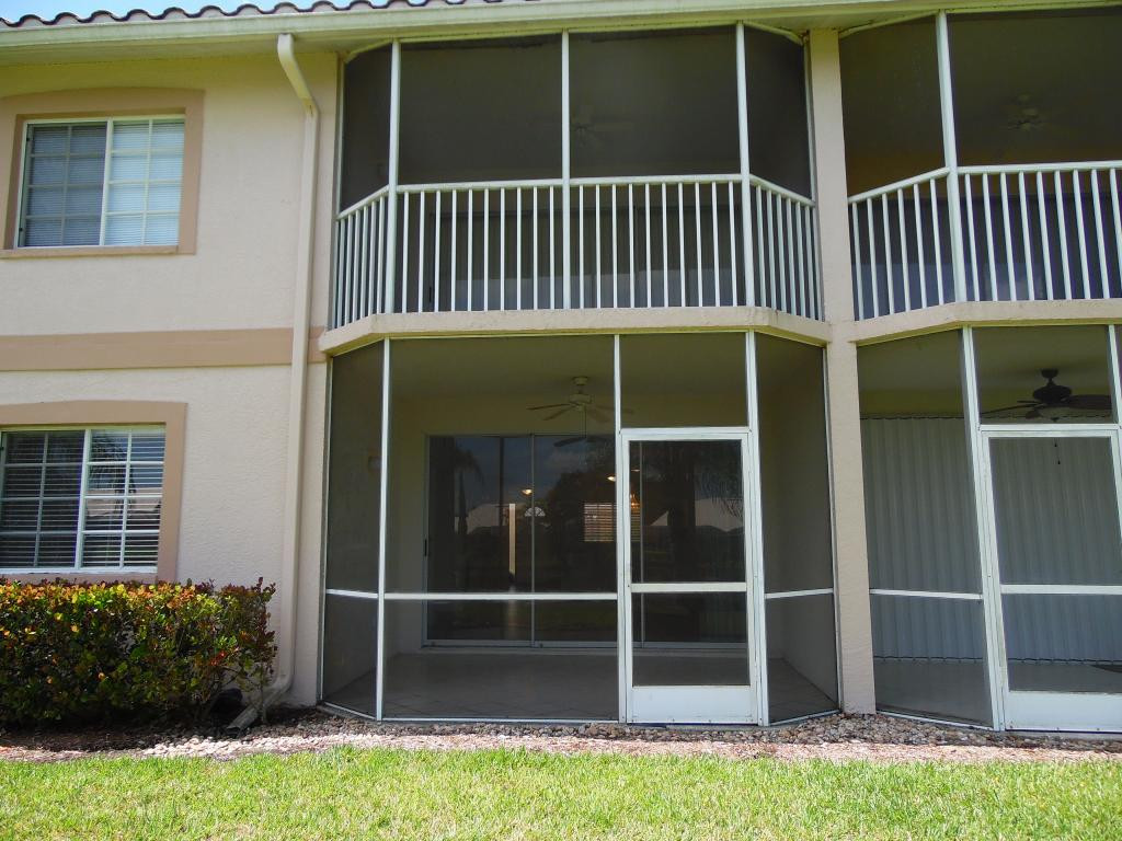 9009 Michael Circle, Unit 109 Naples, FL 34113 - Photo 13 of 18 a view of a house with a window