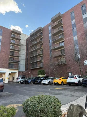 a view of a city with tall buildings