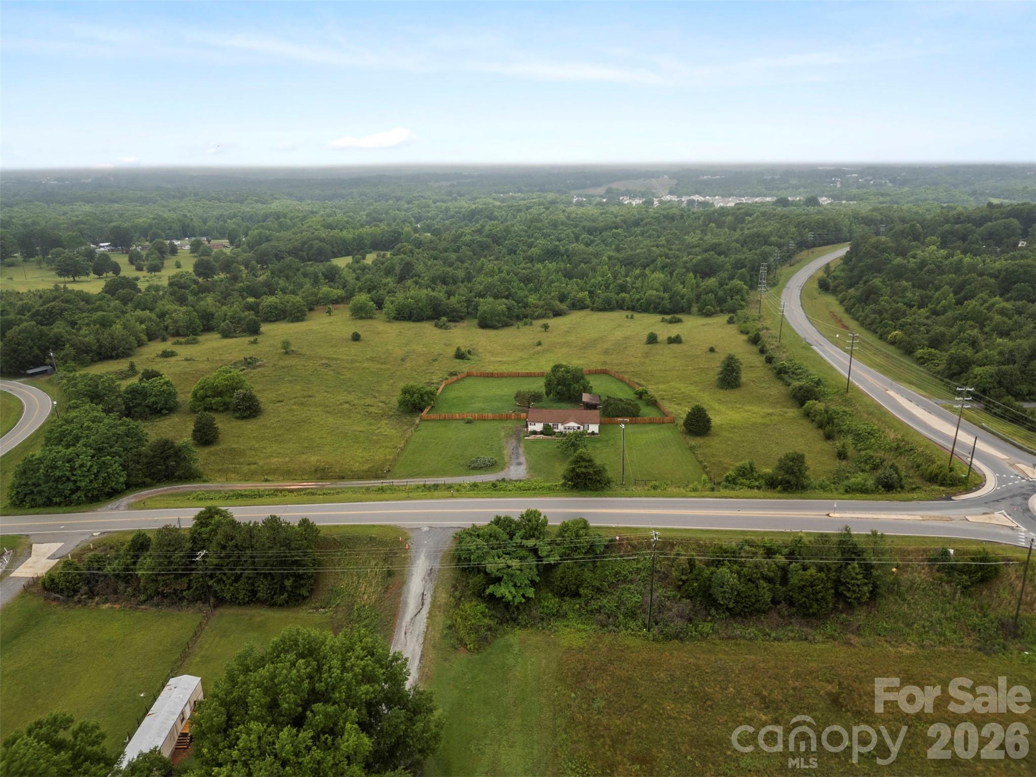 638 Margrace Road Kings Mountain, NC 28086 - Photo 4 of 12 a view of a lake with a city