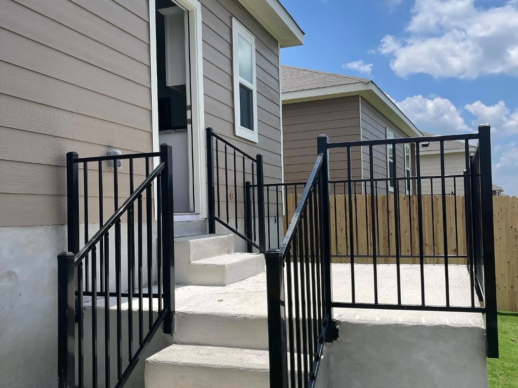 627 Alterra Way Maxwell, TX 78656 - Photo 8 of 10 a view of staircase with railing and a window
