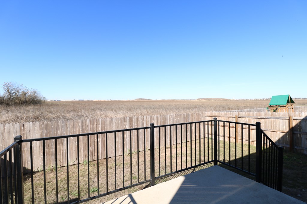 627 Alterra Way Maxwell, TX 78656 - Photo 9 of 10 a balcony with an ocean view