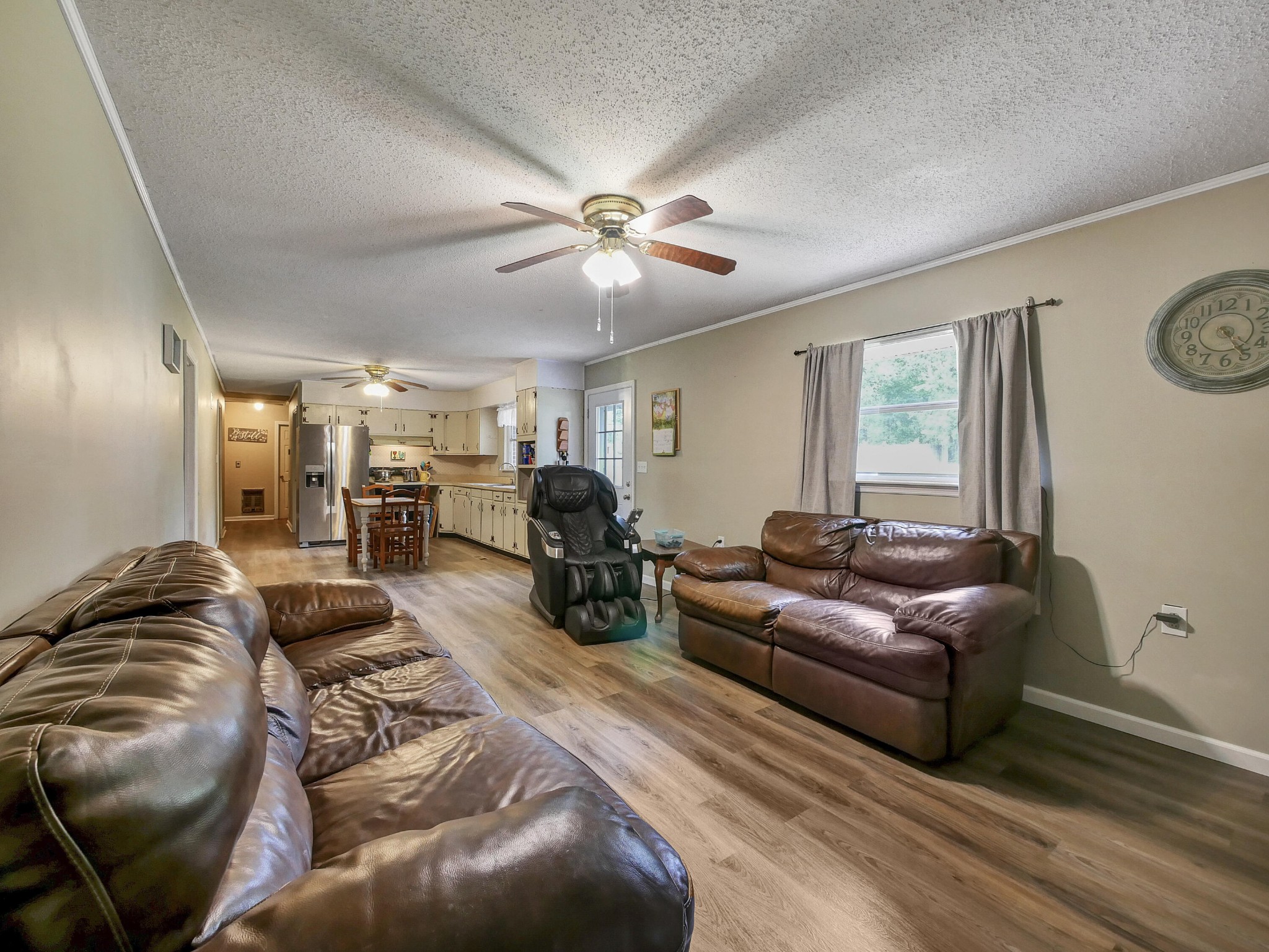 902 Lindsay Avenue Chattanooga, TN 37421 - Photo 11 of 29 a living room with furniture a ceiling fan and a window
