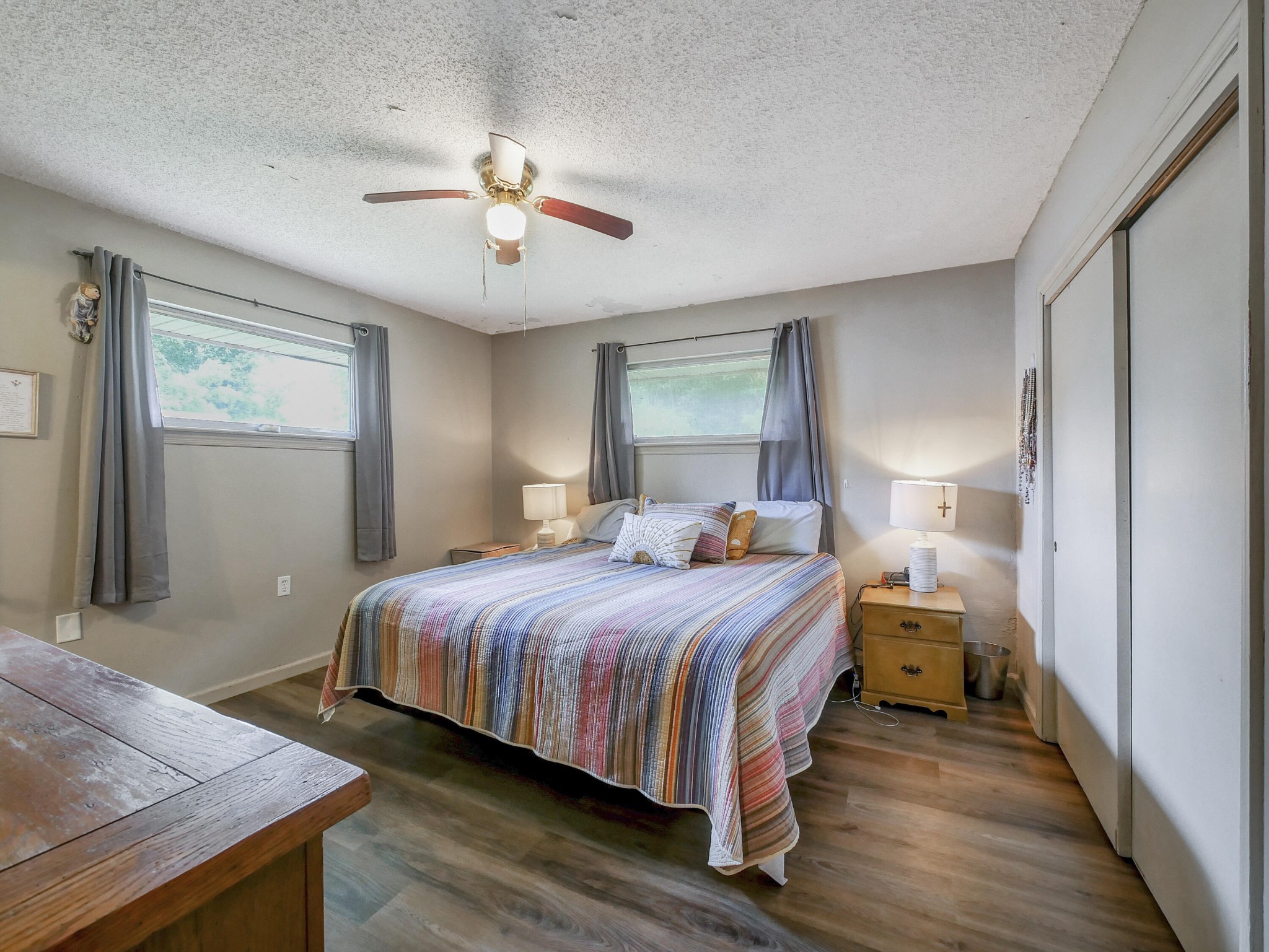902 Lindsay Avenue Chattanooga, TN 37421 - Photo 21 of 29 a bedroom with a bed and wooden floor