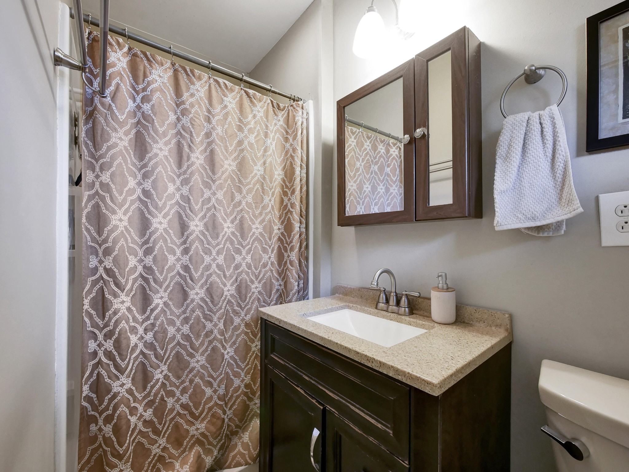 902 Lindsay Avenue Chattanooga, TN 37421 - Photo 23 of 29 a bathroom with a sink and a mirror
