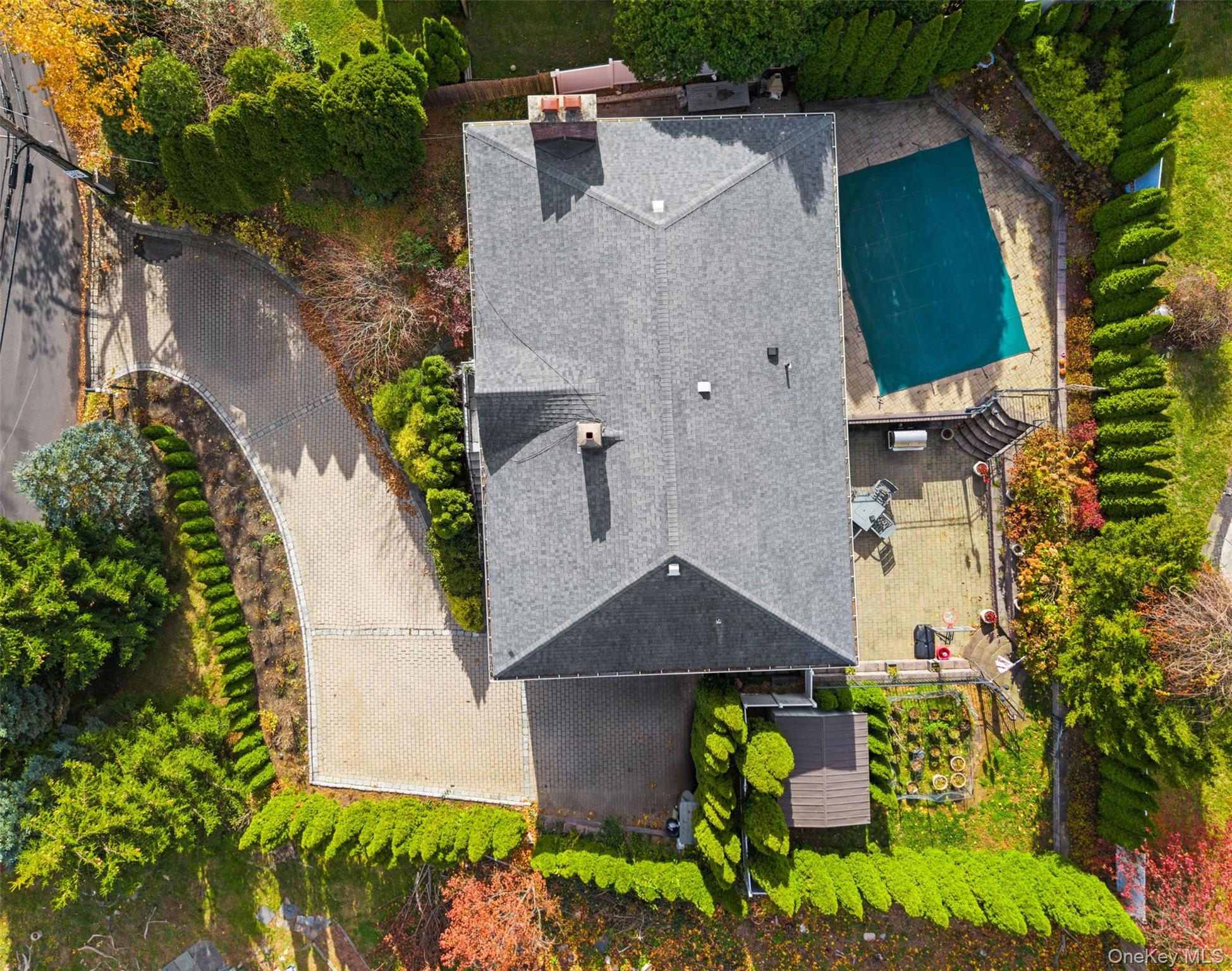 6 Hunting Ridge Road White Plains, NY 10605 - Photo 29 of 32 an aerial view of a house with swimming pool and garden