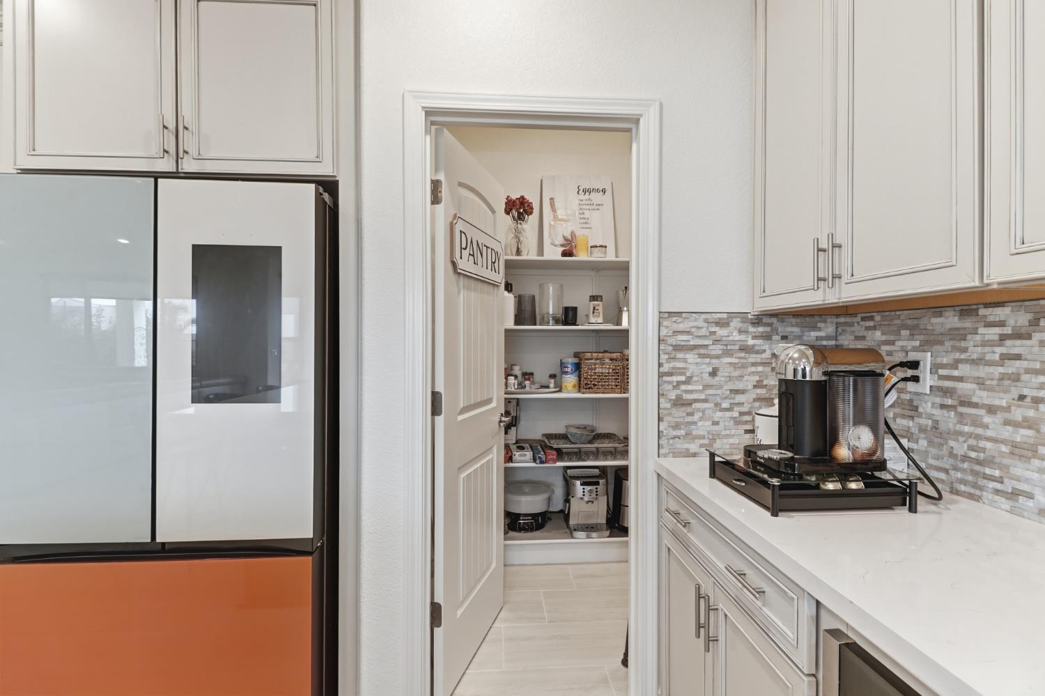5321 Fandango Loop Roseville, CA 95747 - Photo 11 of 38 a kitchen with cabinets and a stove top oven