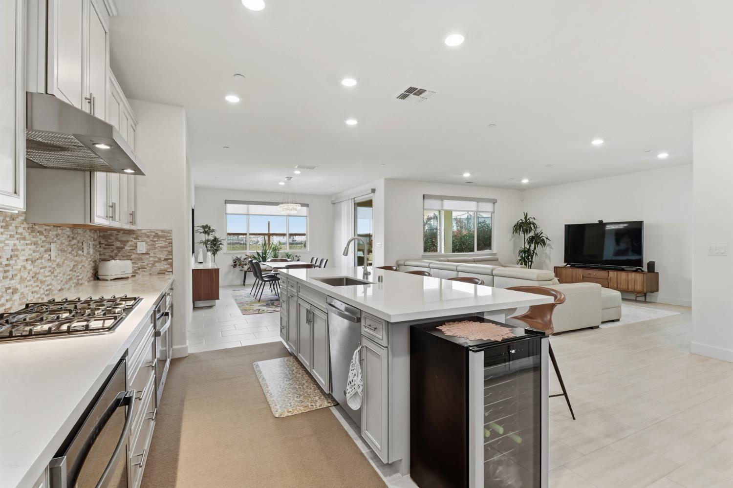 5321 Fandango Loop Roseville, CA 95747 - Photo 13 of 38 a kitchen with counter top space appliances and a sink