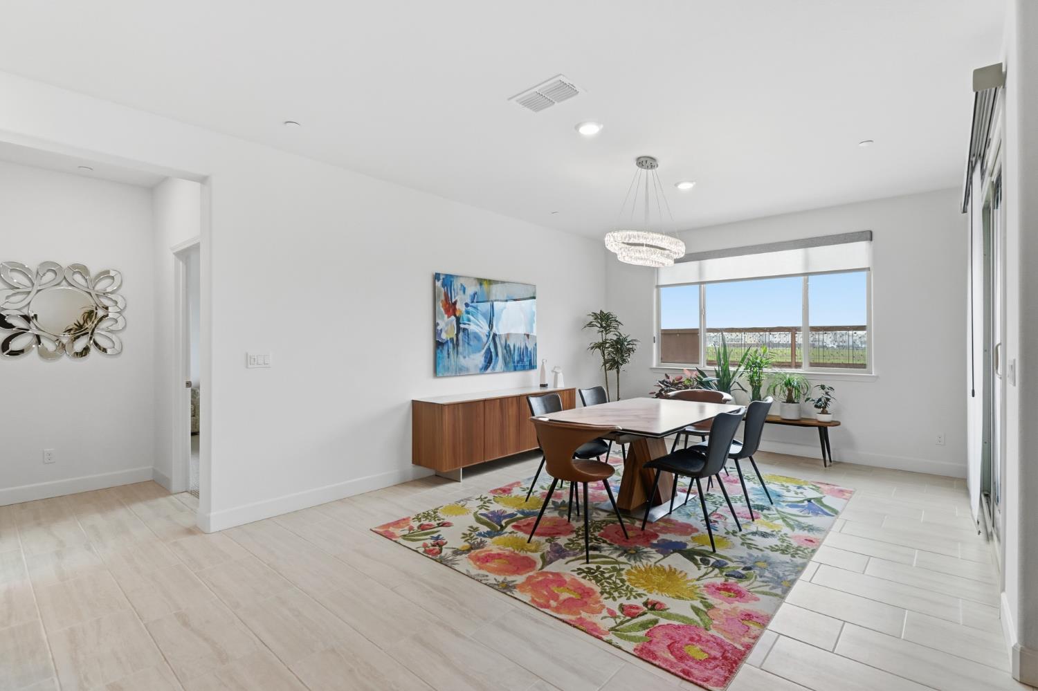 5321 Fandango Loop Roseville, CA 95747 - Photo 14 of 38 a view of a dining room with furniture window and wooden floor