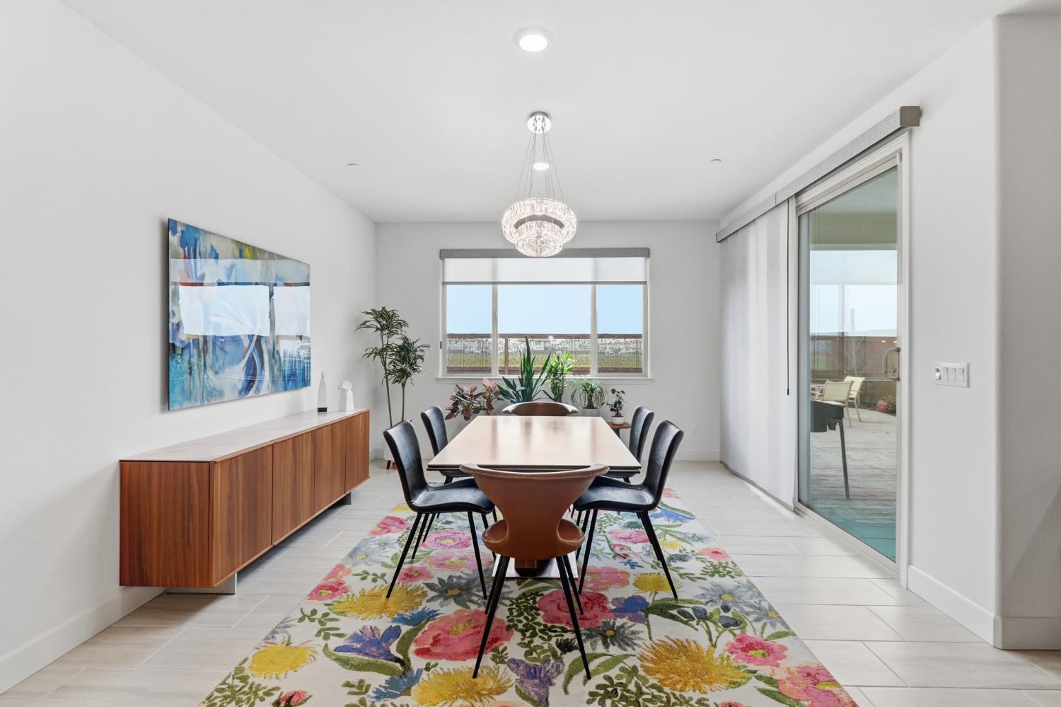 5321 Fandango Loop Roseville, CA 95747 - Photo 15 of 38 a view of a dining room with furniture and window