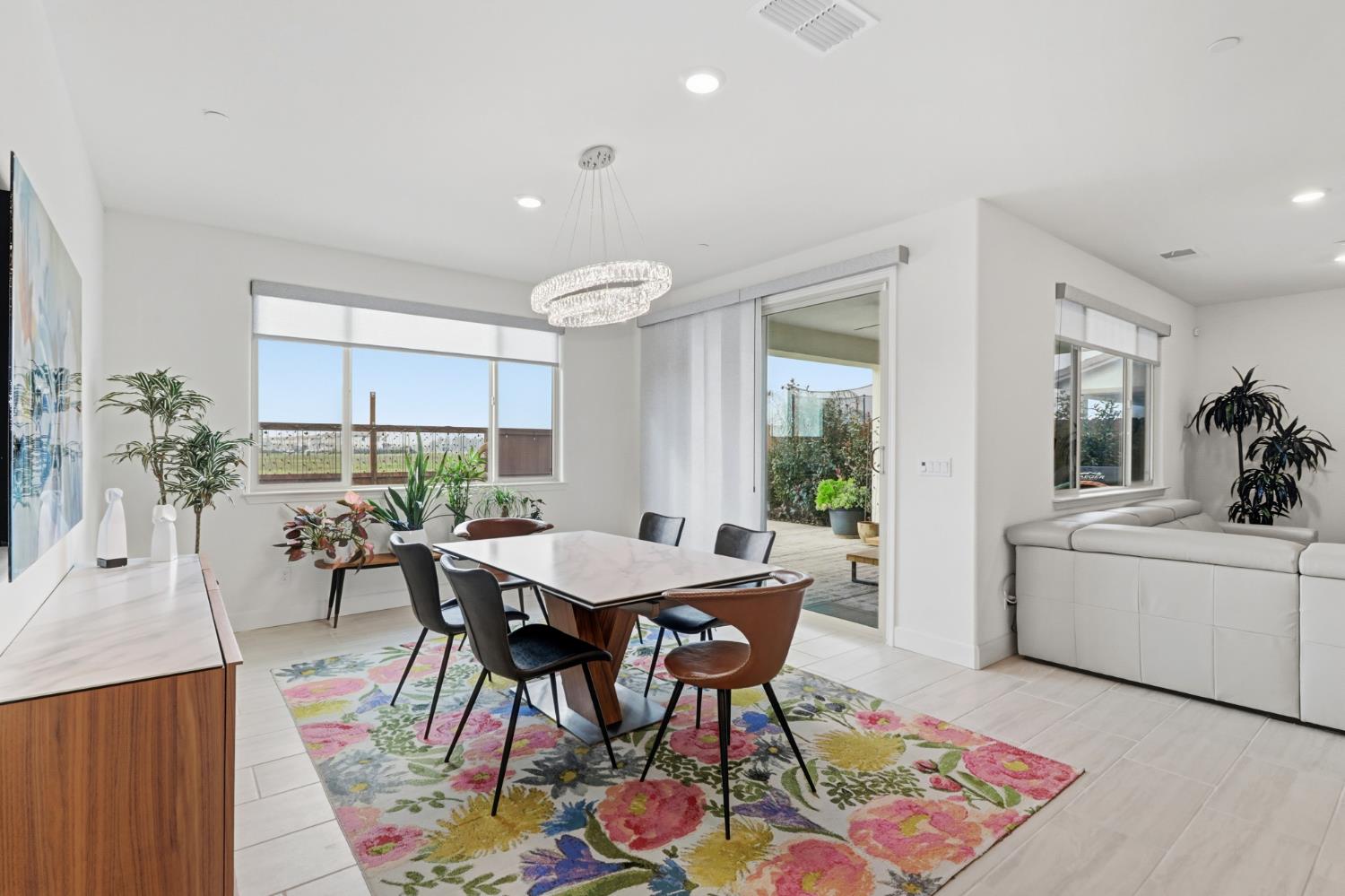 5321 Fandango Loop Roseville, CA 95747 - Photo 16 of 38 a view of a dining room with furniture and window