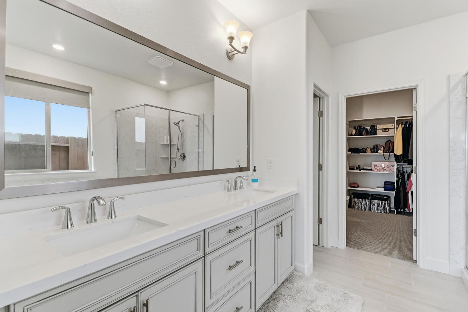 5321 Fandango Loop Roseville, CA 95747 - Photo 22 of 38 a bathroom with a sink and a mirror