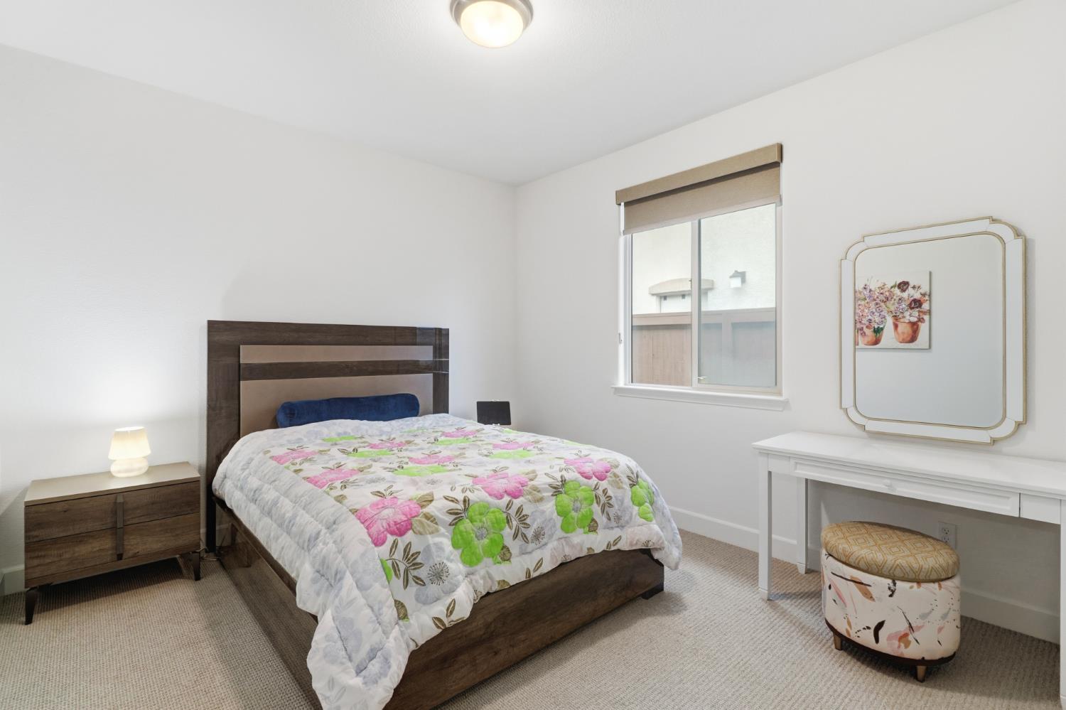 5321 Fandango Loop Roseville, CA 95747 - Photo 25 of 38 a bedroom with a bed and window