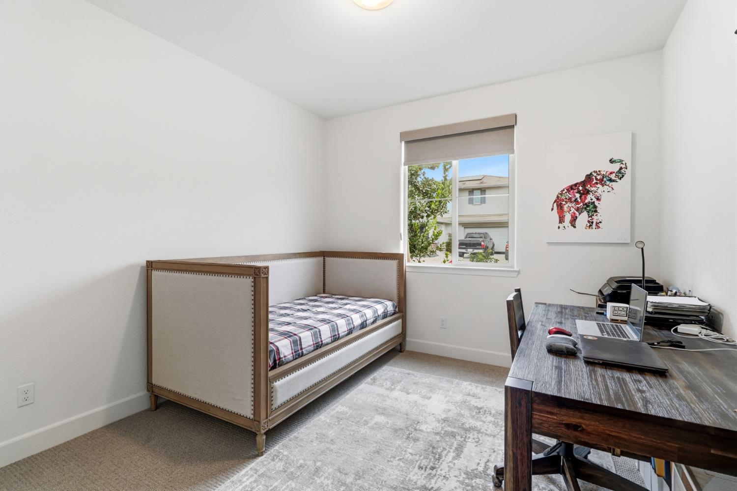 5321 Fandango Loop Roseville, CA 95747 - Photo 28 of 38 a bedroom with a bed and a desk