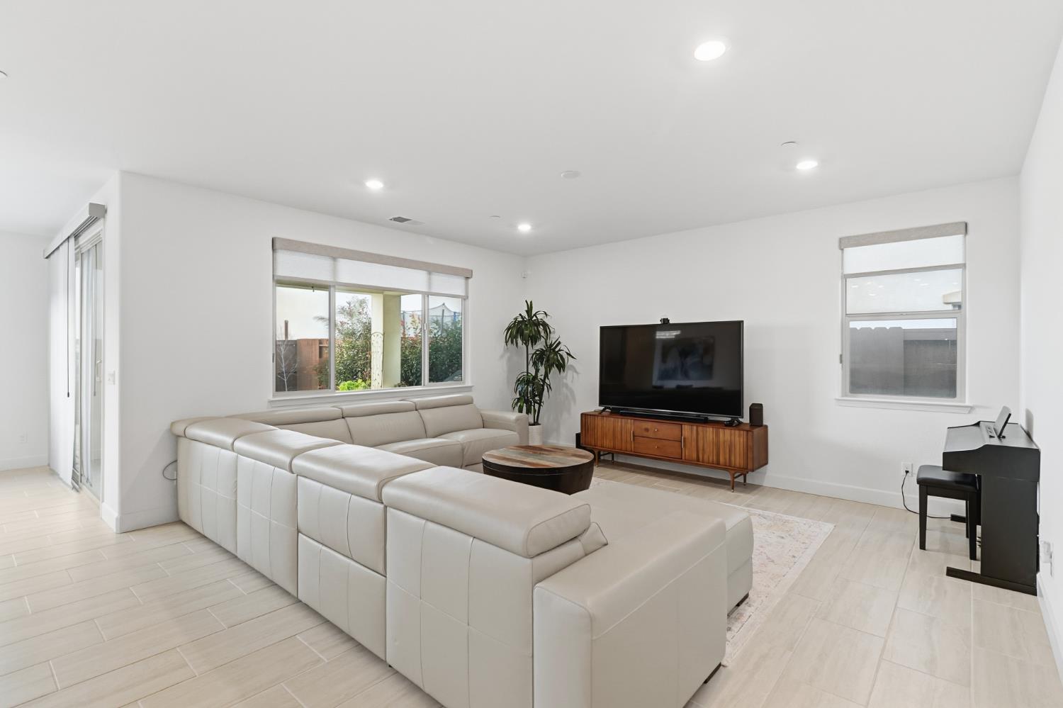 5321 Fandango Loop Roseville, CA 95747 - Photo 3 of 38 a living room with furniture and a flat screen tv