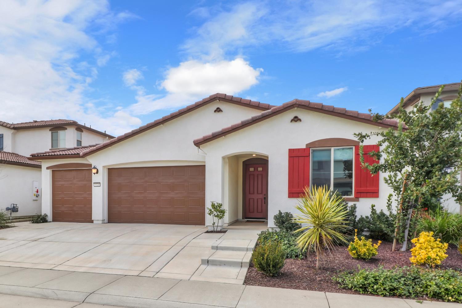 5321 Fandango Loop Roseville, CA 95747 - Photo 37 of 38 a front view of a house with plants