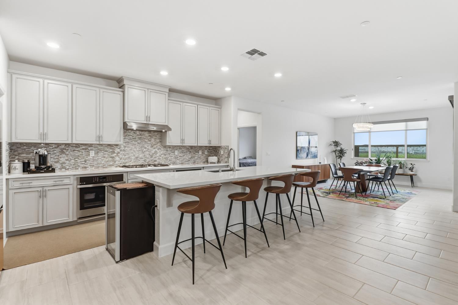 5321 Fandango Loop Roseville, CA 95747 - Photo 5 of 38 a kitchen with cabinets table and chairs