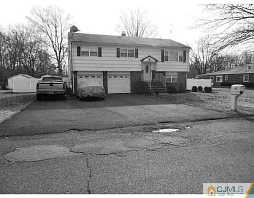 43 Poplar Road Piscataway, NJ 08854 - Photo 1 of 21 a view of a car park in front of house