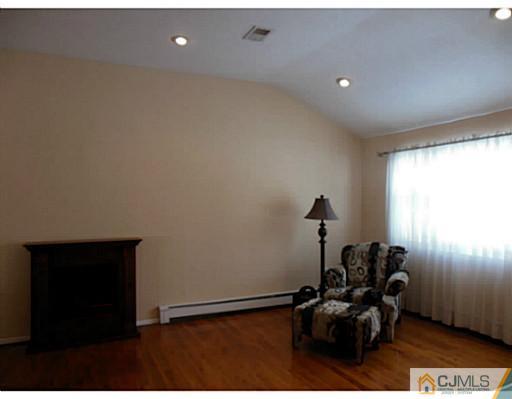 43 Poplar Road Piscataway, NJ 08854 - Photo 14 of 21 a living room with furniture and a window