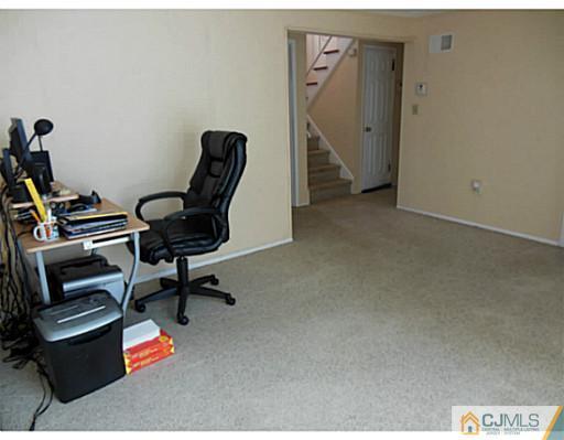 43 Poplar Road Piscataway, NJ 08854 - Photo 21 of 21 a living room with furniture and a piano