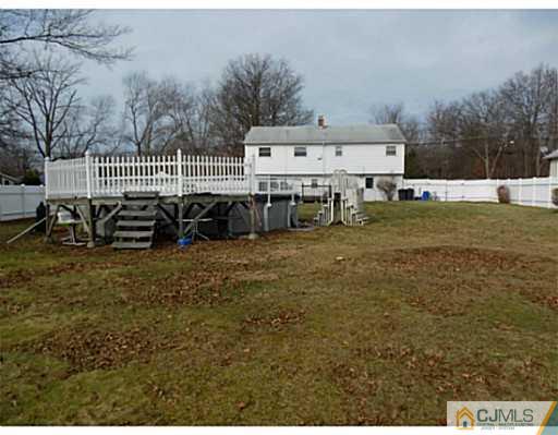 43 Poplar Road Piscataway, NJ 08854 - Photo 6 of 21 a view of a house with backyard