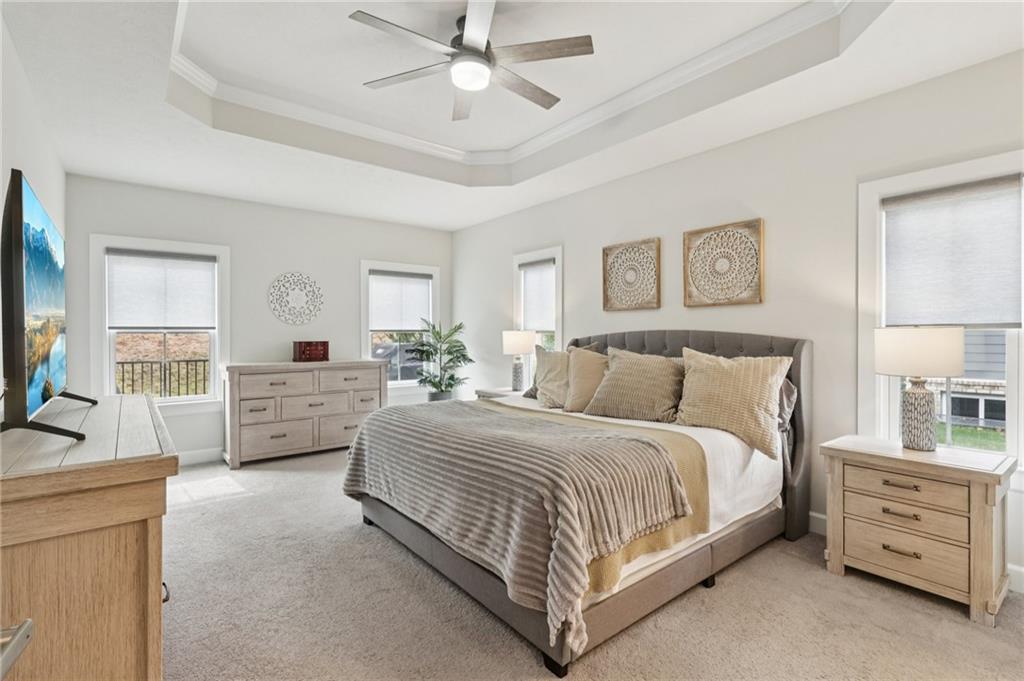 320 Crest Lane Mars, PA 16046 - Photo 16 of 37 a spacious bedroom with a bed and a couch
