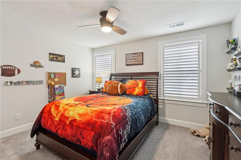 320 Crest Lane Mars, PA 16046 - Photo 26 of 37 a bed sitting in a bedroom next to a window