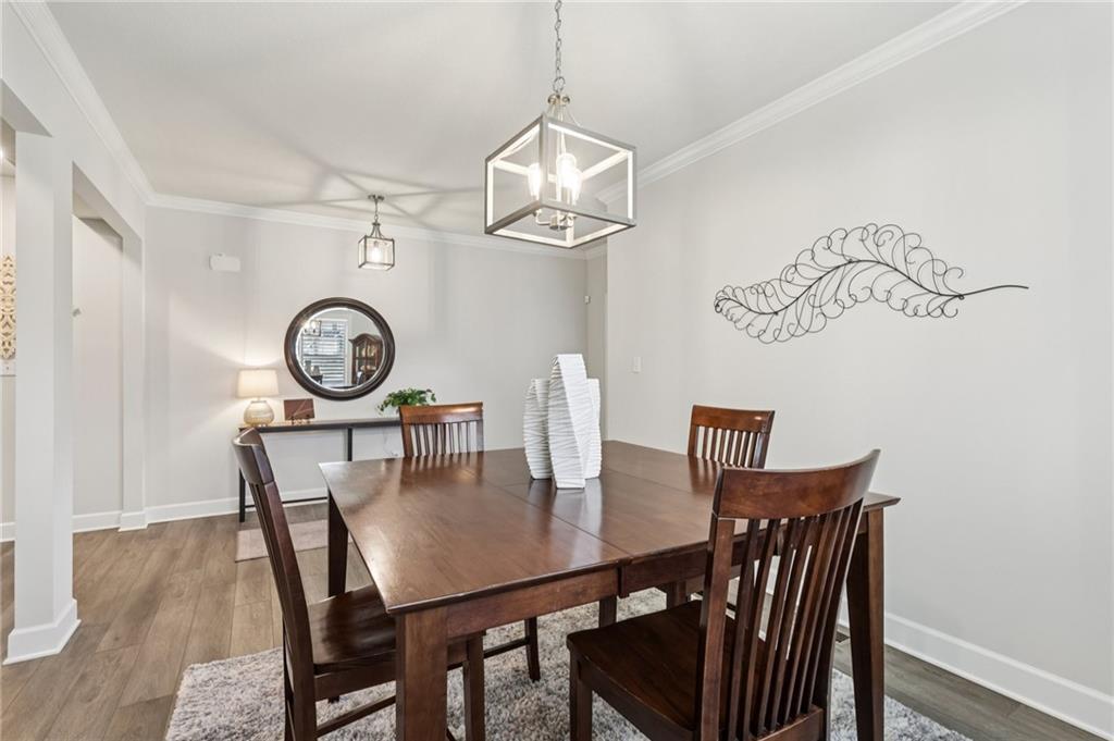 320 Crest Lane Mars, PA 16046 - Photo 6 of 37 a view of a dining room with furniture and wooden floor
