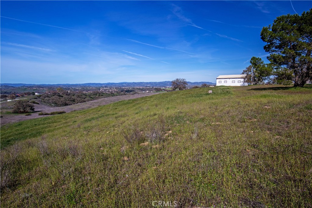 930 Windwood Road Paso Robles, CA 93446 - Photo 26 of 67 a view of a green field with lots of bushes