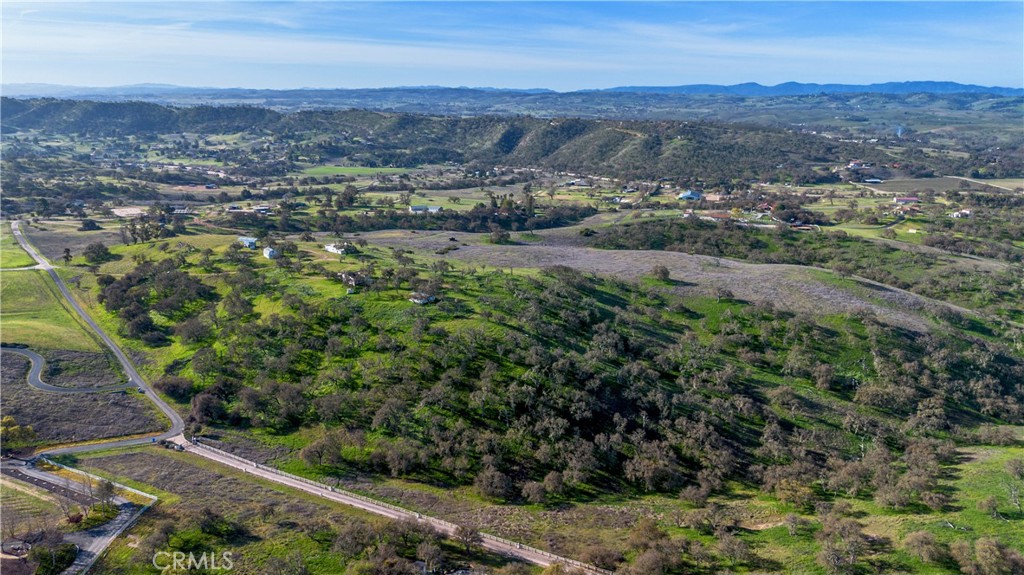 930 Windwood Road Paso Robles, CA 93446 - Photo 6 of 67 an aerial view of residential house and green space