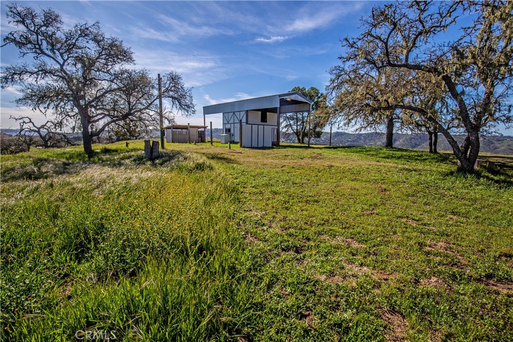 930 Windwood Road Paso Robles, CA 93446 - Photo 7 of 67 a view of house with outdoor space and garden