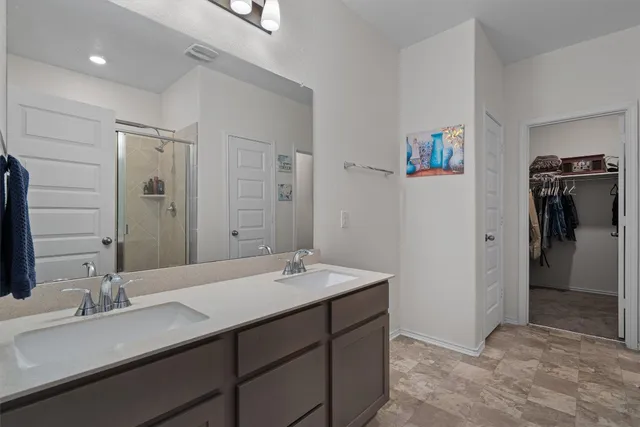 a bathroom with a sink double vanity