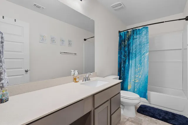 a view of empty room with windows