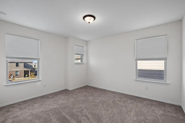 a view of empty room with windows