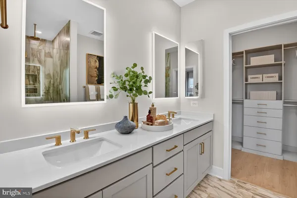 a bathroom with a bathtub and shower
