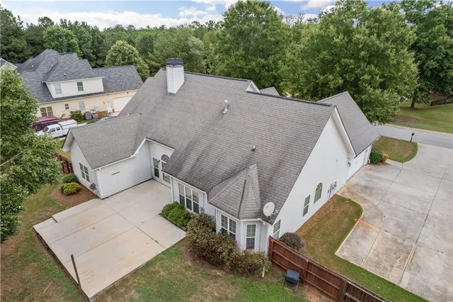 an aerial view of a house with garden