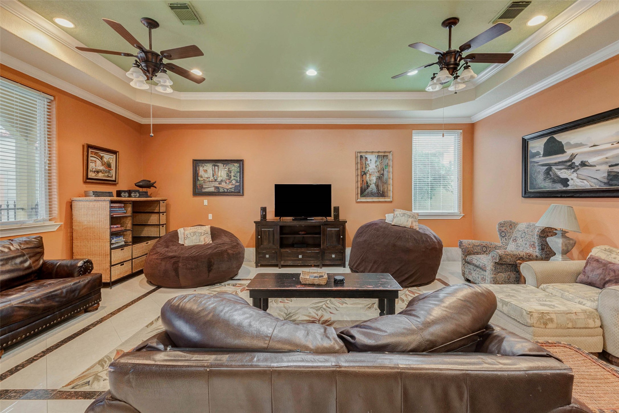 2732 Broadway Street Dickinson, TX 77539 - Photo 17 of 50 a living room with furniture and a flat screen tv