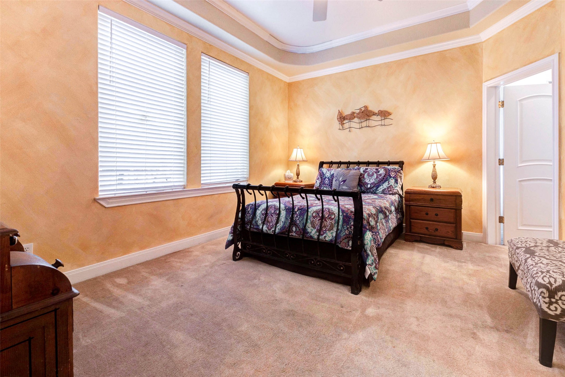 2732 Broadway Street Dickinson, TX 77539 - Photo 33 of 50 a bed sitting in a bedroom next to a window