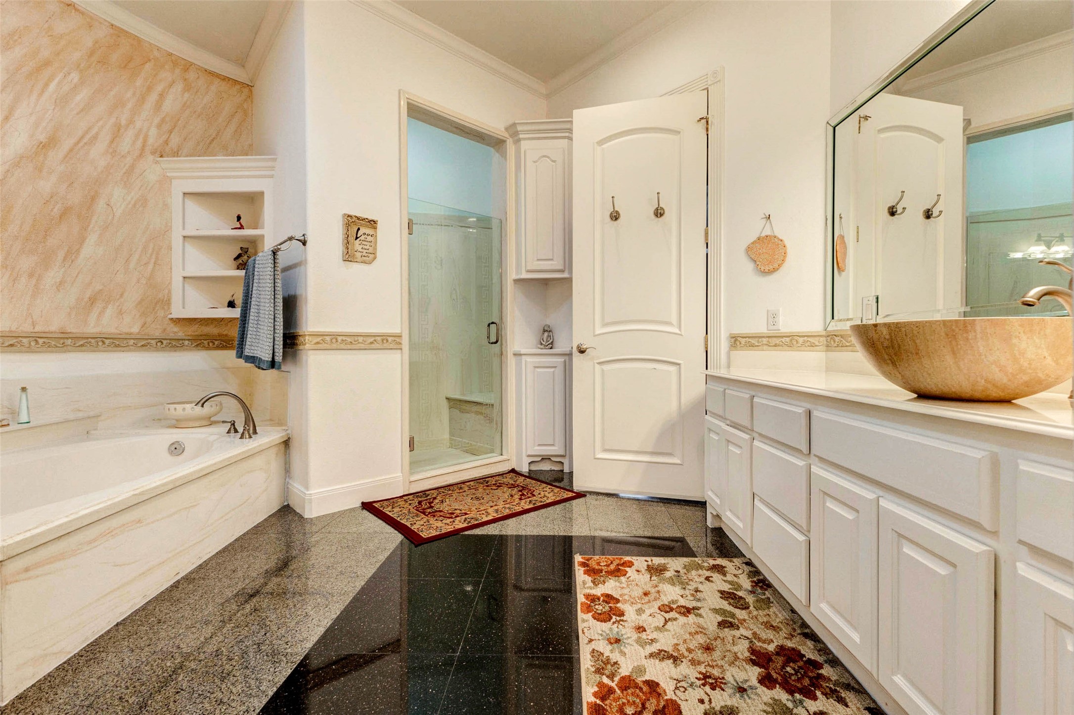 2732 Broadway Street Dickinson, TX 77539 - Photo 41 of 50 a bathroom with a tub sink and mirror