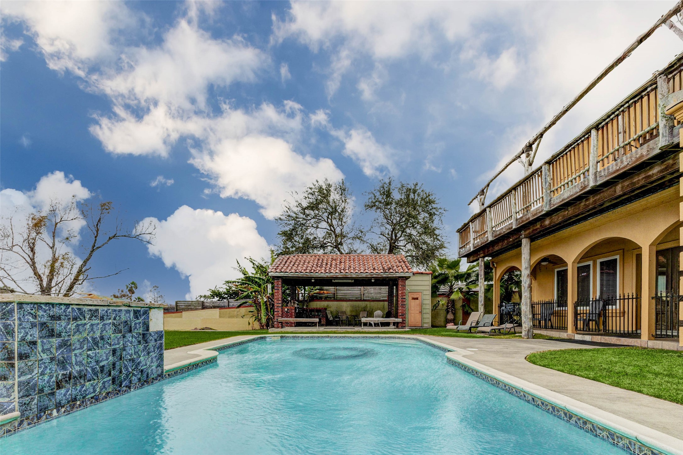 2732 Broadway Street Dickinson, TX 77539 - Photo 44 of 50 a view of a big house with a big yard and large trees