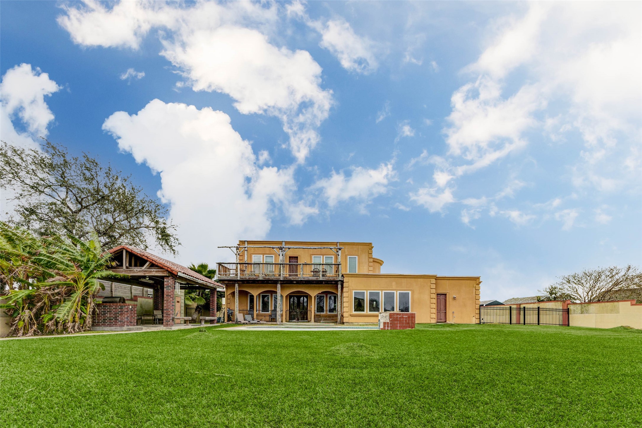 2732 Broadway Street Dickinson, TX 77539 - Photo 46 of 50 a view of a house with a big yard and large trees
