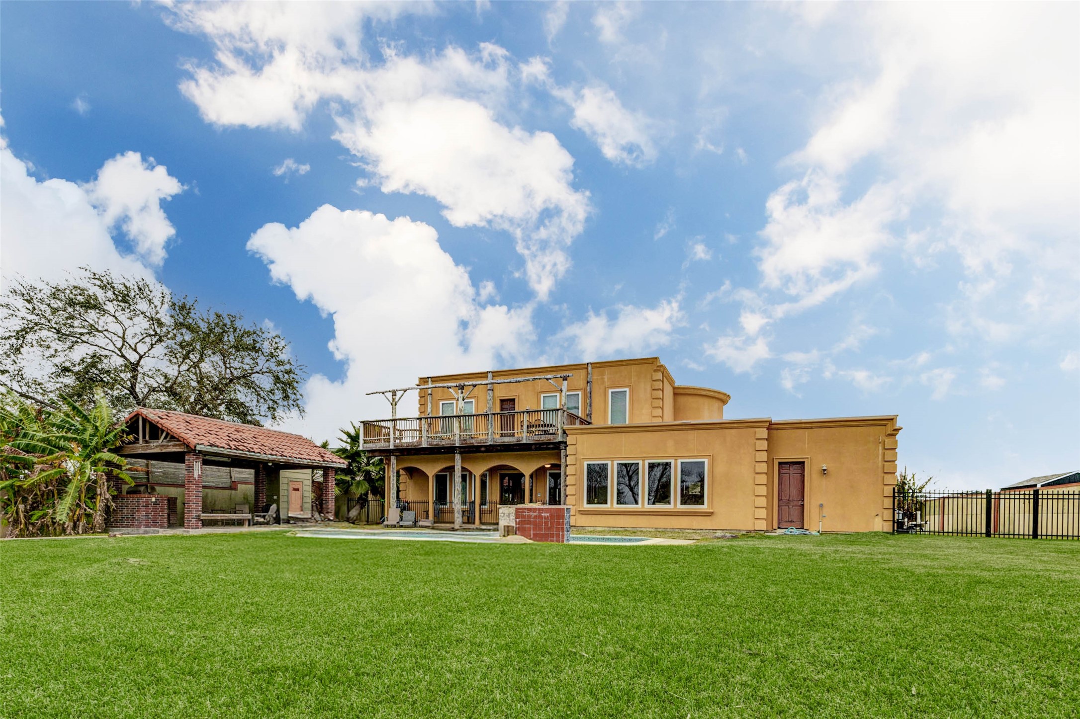 2732 Broadway Street Dickinson, TX 77539 - Photo 47 of 50 a view of a house with a big yard and large trees