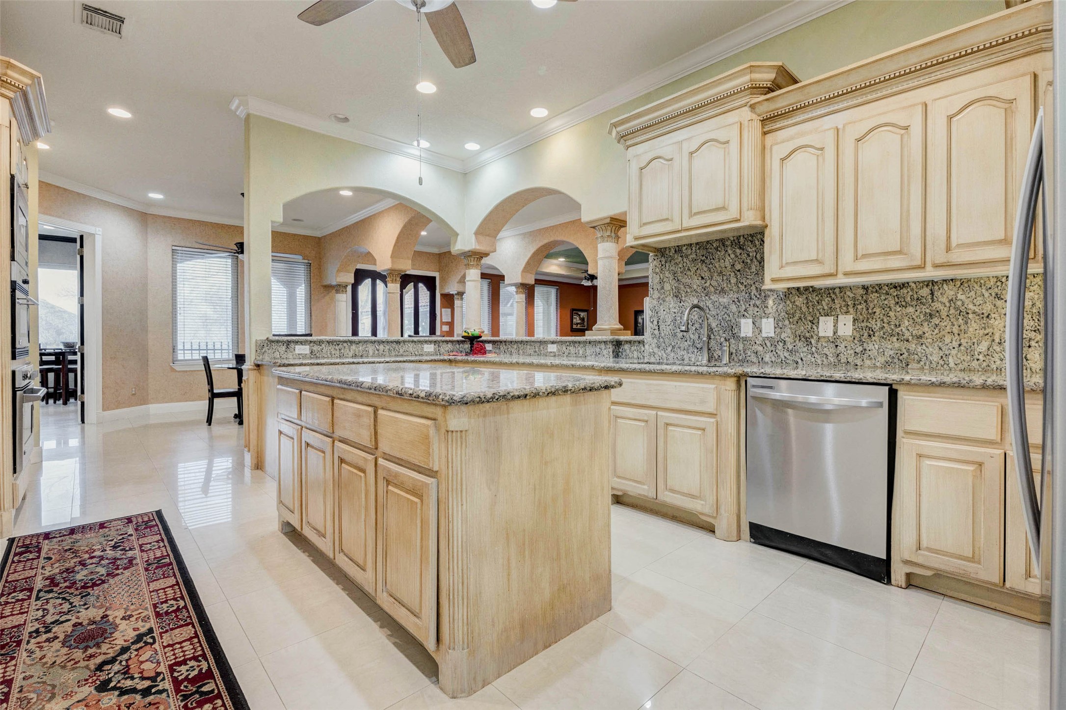2732 Broadway Street Dickinson, TX 77539 - Photo 8 of 50 a kitchen with stainless steel appliances granite countertop a stove and a sink