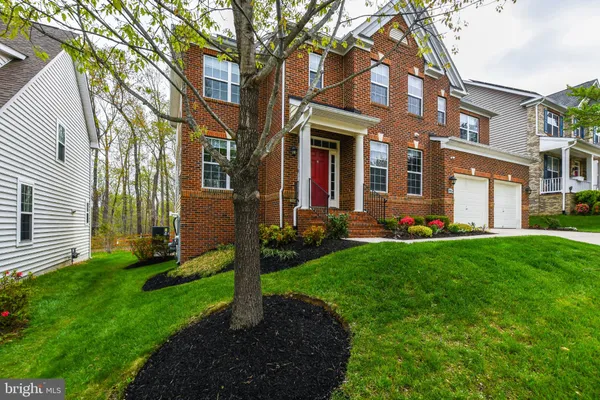 a kitchen with granite countertop a sink and a window