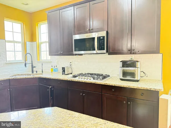 a bedroom with furniture and a bed